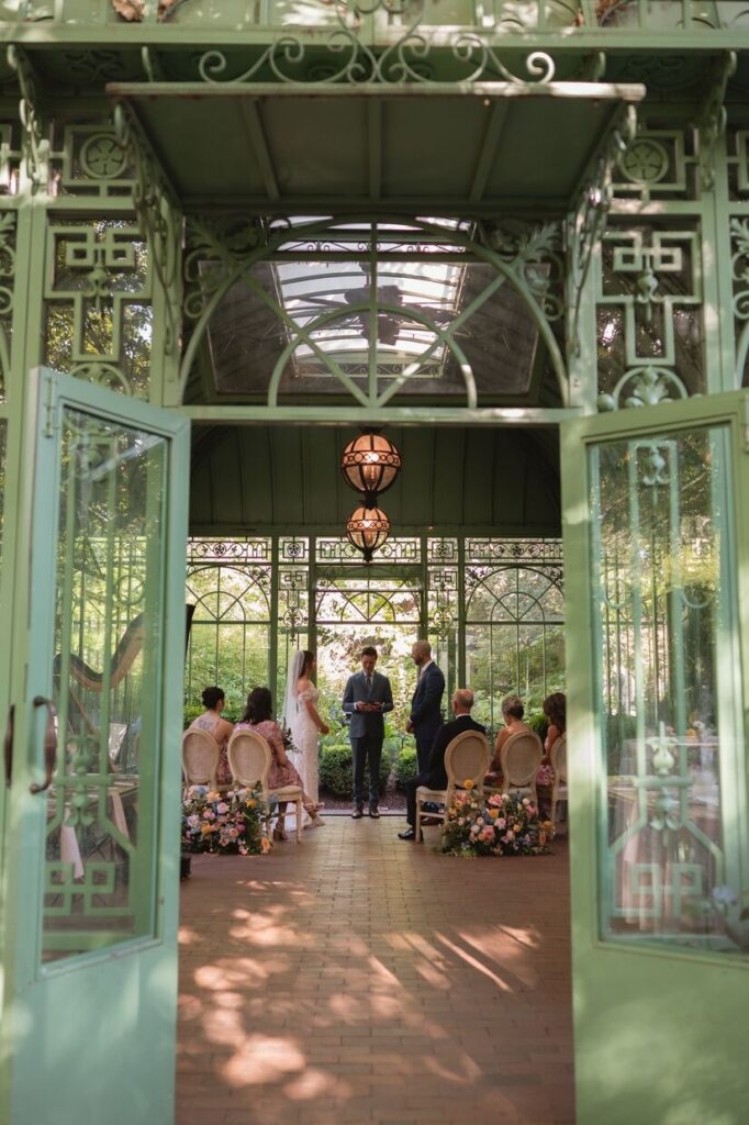 A ceremony inside the Woodlands Mosaic at Denver Botanics Garden, the perfect intimate wedding venue in Colorado