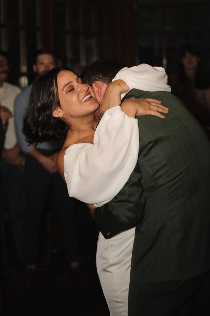 Bride and groom hugging during a dance at a micro wedding venue in Colorado