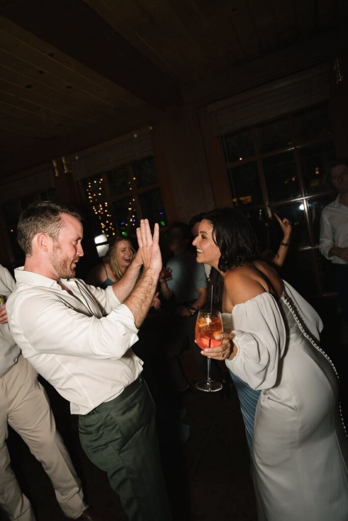 Bride and groom dancing at reception at a micro wedding venue in Colorado
